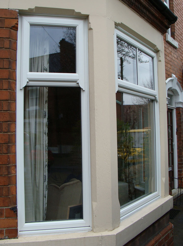 White Georgian bay window with sash horns in West Bridgford